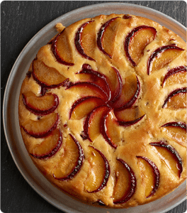 Freshly baked Almond Plum Cake topped with plum slices.