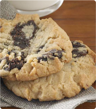 Two Peanut Butter Chocolate Chip cookies on a napkin.
