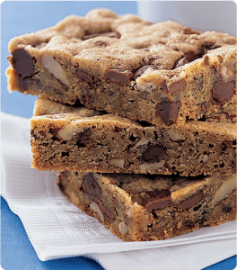 A stack of Toffee Cookies Bars on a napkin.