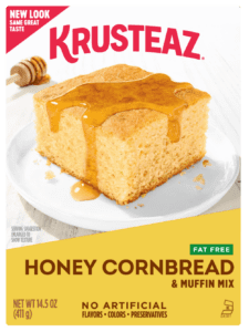 A box of Krusteaz Fat Free Honey Cornbread & Muffin Mix.
