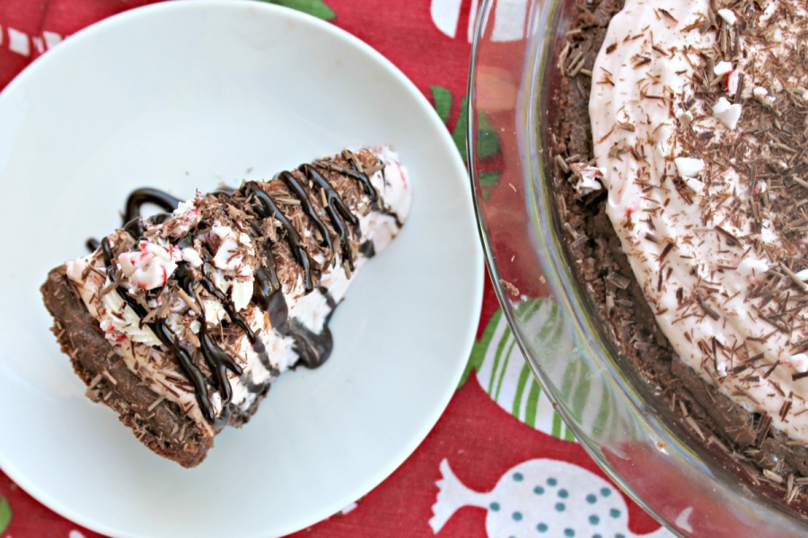 A slice of Chocolate Chunk Peppermint Pie topped with chocolate shavings.