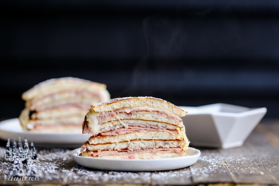 Two plates with stacks of Monte Cristo Pancakes.