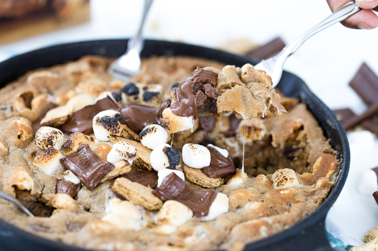 A skillet filled with a Skillet S'mores Chocolate Chunk Cookie.