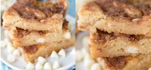 A stack of Snickerdoodle Gooey Bars garnished with white chocolate chips.