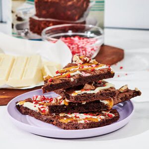 Alt text: "A gluten-free treat that satisfies your sweet tooth cravings. This brownie brittle is a thin, crispy snack made with gluten-free ingredients and packed with rich chocolate flavor