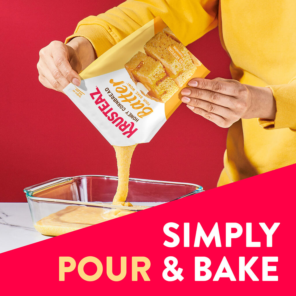 Woman pouring cornbake batter in before baking